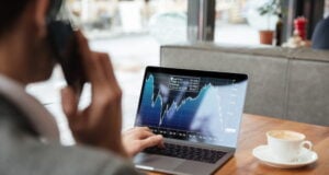 https://www.freepik.com/free-photo/cropped-image-businessman-sitting-by-table-cafe-analyzing-indicators-laptop-computer-while-talking-by-smartphone_6876013.htm#query=stock%20market%20cryptocurrency&position=12&from_view=search