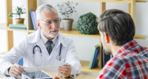 https://www.freepik.com/premium-photo/elderly-doctor-listening-young-patient_3019418.htm#query=doctor%20patient&position=14&from_view=search&track=sph