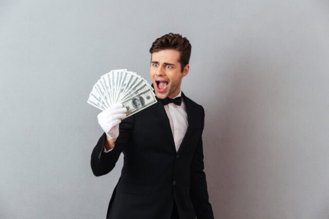 excited-screaming-young-waiter-holding-money https://www.freepik.com/free-photo/excited-screaming-young-waiter-holding-money_6873205.htm#query=tuxedo%20money&position=5&from_view=search&track=sph