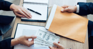 https://www.vecteezy.com/photo/5407275-entrepreneurs-are-receiving-money-that-is-a-bribe-of-their-partners-with-both-of-whom-are-corrupt-in-the-company-room