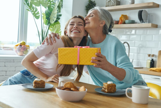 https://www.vecteezy.com/photo/10153484-happy-senior-woman-receiving-a-gift-box-from-her-adult-daughter-while-both-sitting-at-the-kitchen