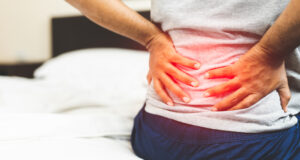 https://www.vecteezy.com/photo/3334188-man-suffering-from-back-pain-on-the-bedroom