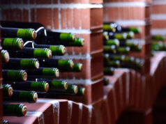 https://www.vecteezy.com/photo/1987162-resting-wine-bottles-stacked-in-a-stone-brick-vault