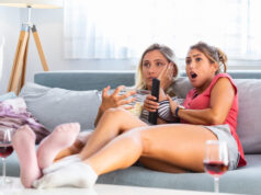 https://www.vecteezy.com/photo/11111198-terrified-friends-watching-tv-in-the-night-sitting-on-a-couch-in-the-living-room-at-home-scary-movie-night-with-girlfriends