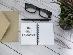 https://www.vecteezy.com/photo/11038063-the-great-resignation-text-on-notepad-with-brown-envelop-on-wooden-table