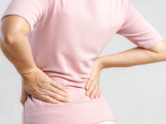 https://www.vecteezy.com/photo/2910486-young-woman-feeling-pain-in-her-back-on-white-background-healthcare-and-medical-concept
