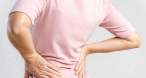 https://www.vecteezy.com/photo/2910486-young-woman-feeling-pain-in-her-back-on-white-background-healthcare-and-medical-concept