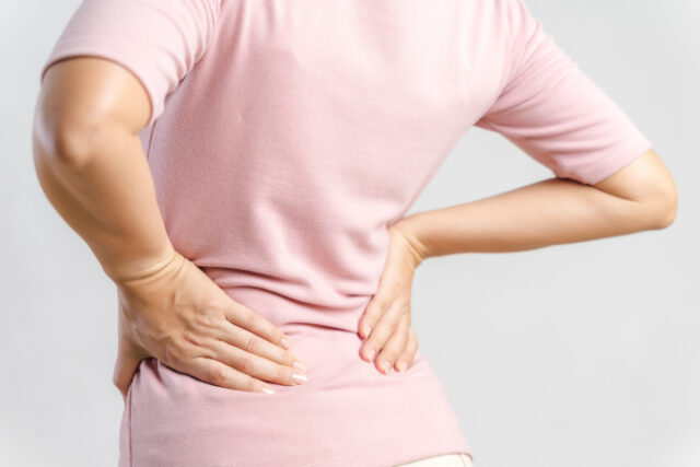 https://www.vecteezy.com/photo/2910486-young-woman-feeling-pain-in-her-back-on-white-background-healthcare-and-medical-concept