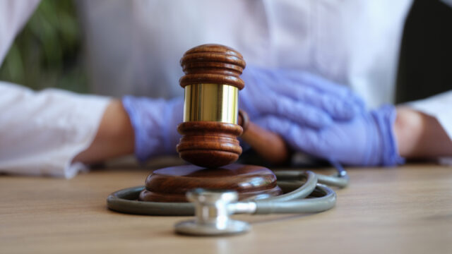 https://www.freepik.com/premium-photo/closeup-female-hands-gloves-striking-with-judge-hammer-medical-malpractice-personal_33196337.htm#query=injury%20lawyer&position=43&from_view=search&track=sph
