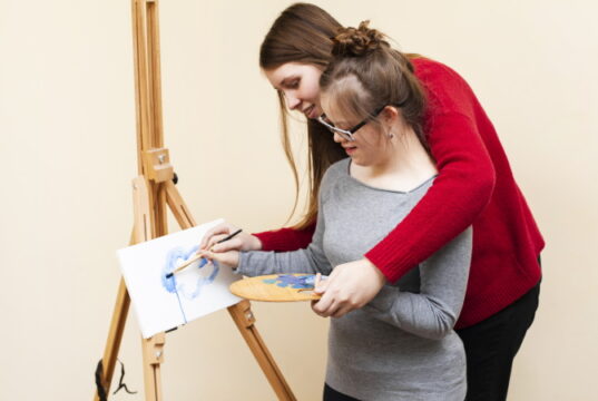 https://www.freepik.com/free-photo/side-view-woman-helping-girl-with-down-syndrome-paint_7088480.htm#query=autism&position=49&from_view=search&track=sph
