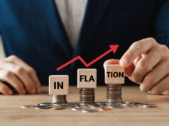 https://www.vecteezy.com/photo/13074341-businessman-puts-a-wooden-cube-on-the-coin-and-the-word-inflation-considering-the-rate-hikes-of-central-banks-in-all-countries-of-the-world-controlling-inflation