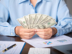 https://www.vecteezy.com/photo/10568396-close-up-young-business-woman-using-counting-cash-money-one-hundred-dollar-bills-checking-financial-documents-sitting-at-table