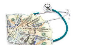 https://www.vecteezy.com/photo/10325488-health-care-costs-stethoscope-on-money-background