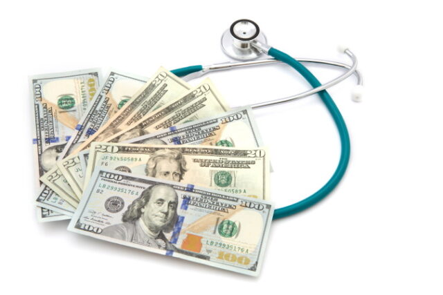 https://www.vecteezy.com/photo/10325488-health-care-costs-stethoscope-on-money-background