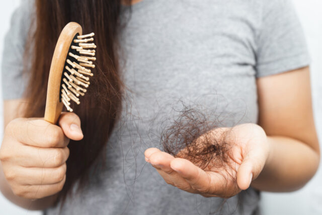 Women with hair loss https://www.vecteezy.com/photo/13036839-woman-having-hair-loss-problem