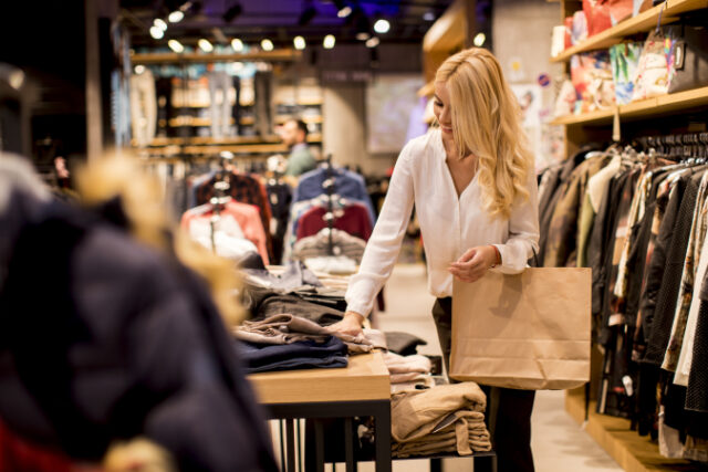 https://www.freepik.com/premium-photo/young-woman-with-shopping-bags-standing-clothing-store_3621476.htm#query=holiday%20shopping&position=29&from_view=search&track=sph