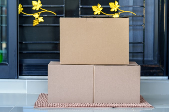 https://www.freepik.com/premium-photo/delivered-parcels-cardboard-box-floor-near-front-door-home_25549776.htm#query=packages%20on%20porch&position=42&from_view=search&track=sph