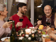 https://www.freepik.com/free-photo/family-celebrating-festive-christmas-dinner_19966252.htm#query=holiday%20dinner&position=24&from_view=search&track=sph