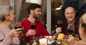 https://www.freepik.com/free-photo/family-celebrating-festive-christmas-dinner_19966252.htm#query=holiday%20dinner&position=24&from_view=search&track=sph