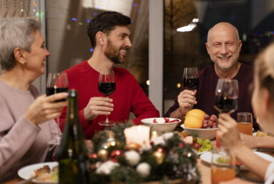 https://www.freepik.com/free-photo/family-celebrating-festive-christmas-dinner_19966252.htm#query=holiday%20dinner&position=24&from_view=search&track=sph