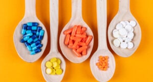 https://www.freepik.com/free-photo/top-view-colorful-pills-wooden-spoons-orange-background-horizontal_7417959.htm#query=supplements&position=0&from_view=search&track=sph
