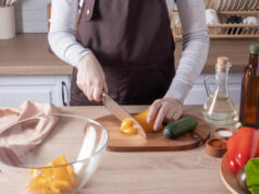 https://www.vecteezy.com/photo/12875777-a-young-girl-cuts-yellow-fresh-pepper-on-a-cutting-board-cooking-vegetable-salad-in-the-kitchen-at-home