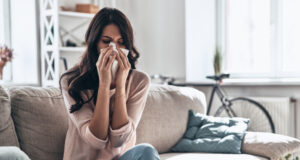 https://www.vecteezy.com/photo/13526331-cold-and-flu-sick-young-woman-blowing-the-nose-using-tissue-paper-while-sitting-on-the-sofa-at-home