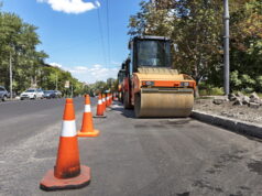 https://www.vecteezy.com/photo/4703472-orange-road-cones-protect-heavy-wheel-compactors-along-the-edge-of-the-city-street-road