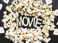 https://www.vecteezy.com/photo/3257761-popcorn-on-black-background-watching-a-movie-with-popcorn