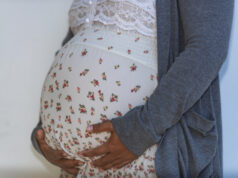 https://www.vecteezy.com/photo/13958964-pregnant-woman-caressing-her-belly-and-making-a-heart-shaped-gesture-with-her-fingers-signifying-her-love-for-her-unborn-child