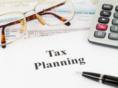 https://www.vecteezy.com/photo/7144280-tax-planning-wirh-calculator-and-glasses-taxation-concept