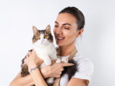 https://www.freepik.com/free-photo/young-housewife-apron-white-background-holds-her-beloved-pet-big-fluffy-cat-happy-family_23542054.htm#query=cats%20people&position=13&from_view=search&track=sph