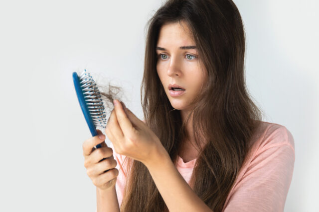 https://www.freepik.com/premium-photo/young-woman-is-upset-because-hair-loss_8127498.htm#query=hair%20loss&position=28&from_view=search&track=sph