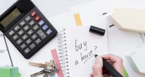 https://www.freepik.com/free-photo/close-up-person-writing-buy-house-spiral-notepad-with-keys-calculator-house-model_3741361.htm#query=rent%20own&position=9&from_view=search&track=ais