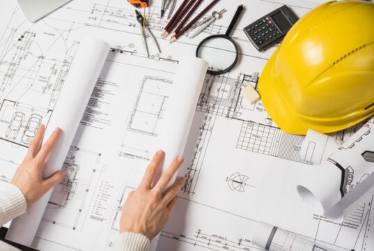 https://www.freepik.com/free-photo/crop-architect-opening-blueprint_1477063.htm#query=Industrial%20Engineering&position=37&from_view=search&track=sph