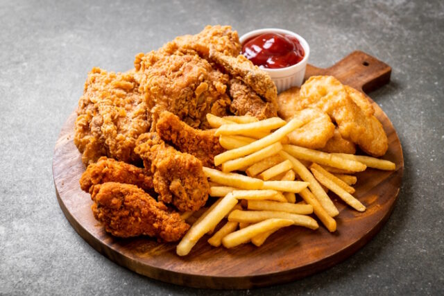 fried chicken with french fries and nuggets meal https://www.freepik.com/premium-photo/fried-chicken-with-french-fries-nuggets-meal_5864795.htm#query=fast%20food&position=7&from_view=search&track=sph