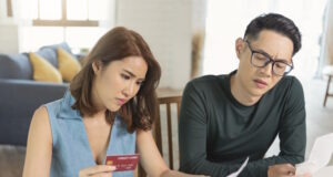 https://www.freepik.com/premium-photo/serious-asian-husband-checking-analyzing-statement-utilities-bills-sitting-together-home_15829312.htm#from_view=detail_alsolike