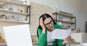 https://www.freepik.com/premium-photo/shocked-young-woman-working-kitchen-table-with-laptop-she-holds-letter-document-her_36993970.htm#page=2&query=bad%20letter&position=10&from_view=search&track=sph