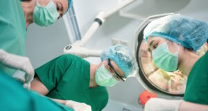 https://www.vecteezy.com/photo/10204042-low-angle-shot-of-professional-surgeons-team-performing-surgery-in-operating-room-surgeon-assistants-and-nurses-performing-surgery-on-a-patient-health-care-cancer-and-disease-treatment-concept
