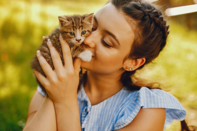 https://www.freepik.com/free-photo/beautiful-cute-girl-blue-dresses-with-beautiful-hairstyles-make-up-sitting_2612015.htm#query=cat%20lover&position=35&from_view=search&track=ais