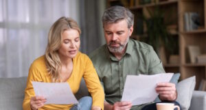 https://www.freepik.com/premium-photo/financial-literacy-busy-middle-aged-husband-wife-calculating-family-budget-together_31097983.htm#page=2&query=personal%20loan&position=41&from_view=search&track=sph