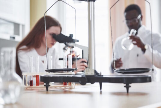 https://www.freepik.com/free-photo/lab-assistant-with-microscope-laboratory-glassware-bulb-with-chemicals_10001376.htm#query=testube%20research&position=29&from_view=search&track=ais