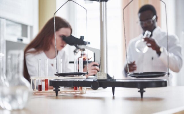 https://www.freepik.com/free-photo/lab-assistant-with-microscope-laboratory-glassware-bulb-with-chemicals_10001376.htm#query=testube%20research&position=29&from_view=search&track=ais