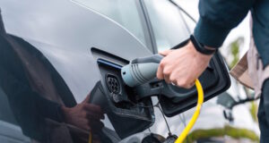 https://www.freepik.com/free-photo/man-plugging-charger-into-electric-car-charge-station_14996774.htm#query=EV&position=17&from_view=search&track=sph