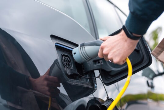 https://www.freepik.com/free-photo/man-plugging-charger-into-electric-car-charge-station_14996774.htm#query=EV&position=17&from_view=search&track=sph