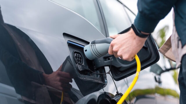 https://www.freepik.com/free-photo/man-plugging-charger-into-electric-car-charge-station_14996774.htm#query=EV&position=17&from_view=search&track=sph