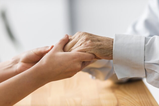 nurse-holding-senior-man-s-hands-comfort https://www.freepik.com/free-photo/nurse-holding-senior-man-s-hands-comfort_10892969.htm#query=hospice&position=44&from_view=search&track=sph