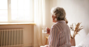 https://www.freepik.com/free-photo/rear-view-senior-sixty-year-old-woman-with-gray-hair-holding-mug-washing-down-sleeping-pill-suffering-from-insomnia-elderly-retired-female-taking-medicine-with-water-sitting-bedroom_11200045.htm#query=dementia&position=14&from_view=search&track=sph