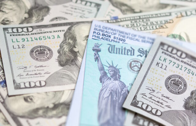 https://www.vecteezy.com/photo/16377045-united-states-irs-check-and-envelope-resting-on-money