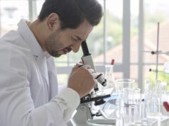 https://www.vecteezy.com/photo/8937899-young-scientist-medical-worker-in-lab-doing-a-microscope-analysis-in-a-laboratory-doing-research